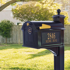 Balmoral decorative mailbox mounted to a black post