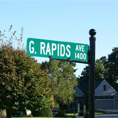 street sign post with standard green street blade