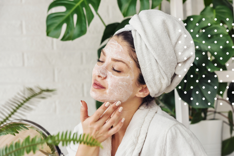 Woman with Face Mask and Towel