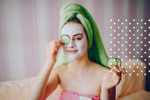 Woman with Face Mask and Cucumbers 