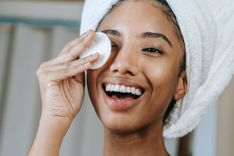 woman applying skincare product for sensitive skin