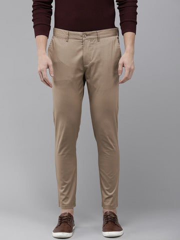 MEN BEIGE SOLID TAPERED FIT CHINOS TROUSERS