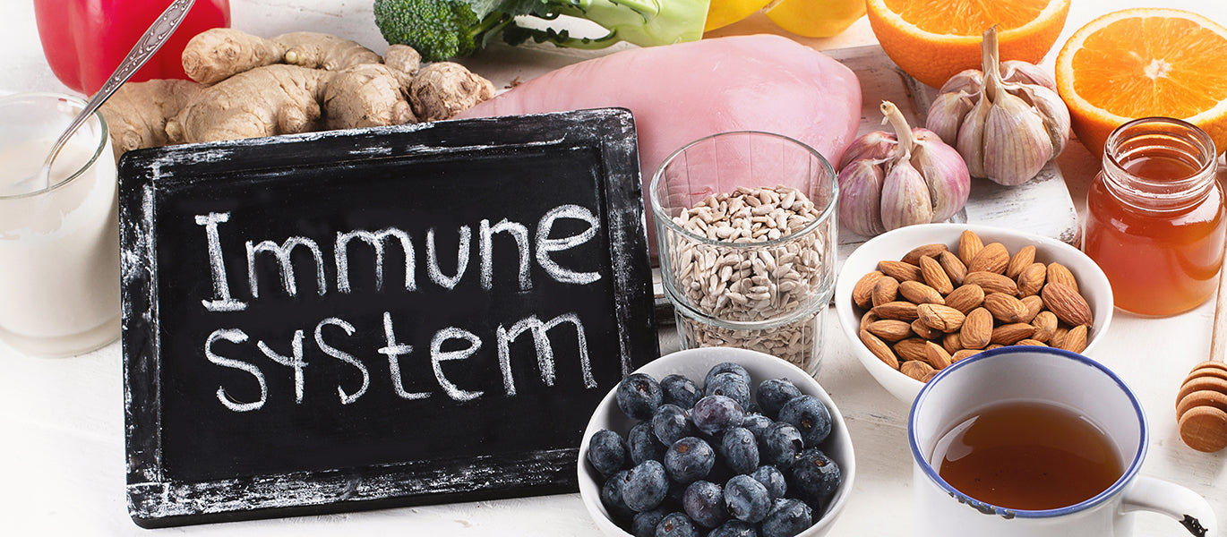 Immunsystem Bild mit Gemüse Nüssen 