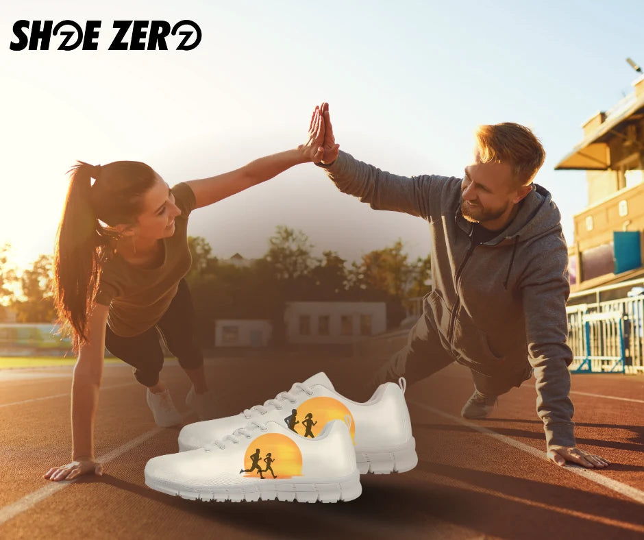 Couple giving each other high five with a couple shoes in the center of them from Shoe Zero
