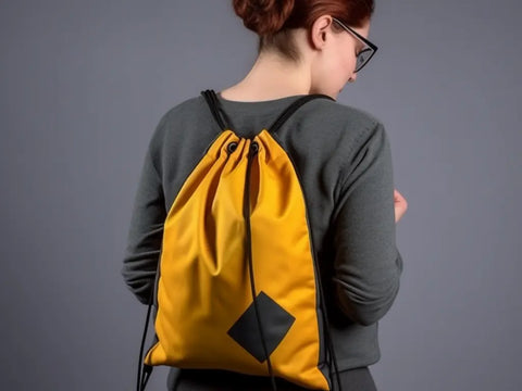 a woman wearing drawstring bag