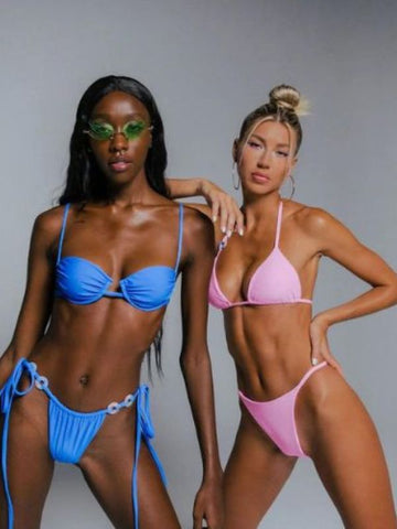 models in blue & pink bikinis Dubai