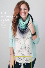 Woman wearing crochet triangle scarf