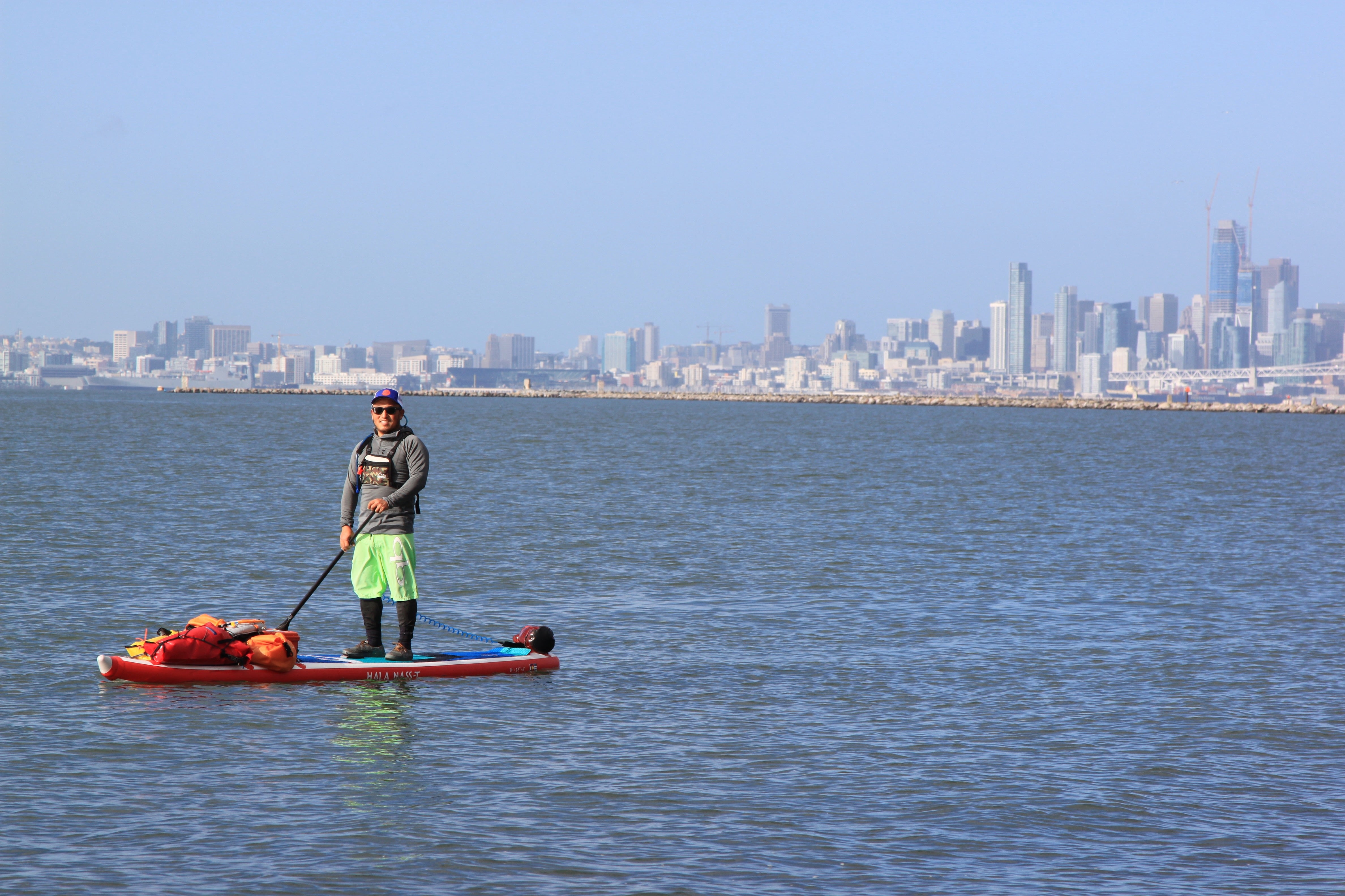 image of Mike Wang SUP paddleboarding in San Francisco Bay
