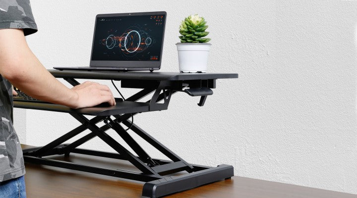 easily assemble the sit stand desk converter in less than 10 min