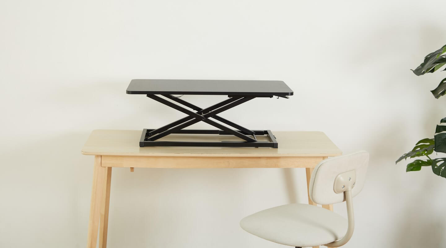 standing desk converter allows you to stand without replacing your desk