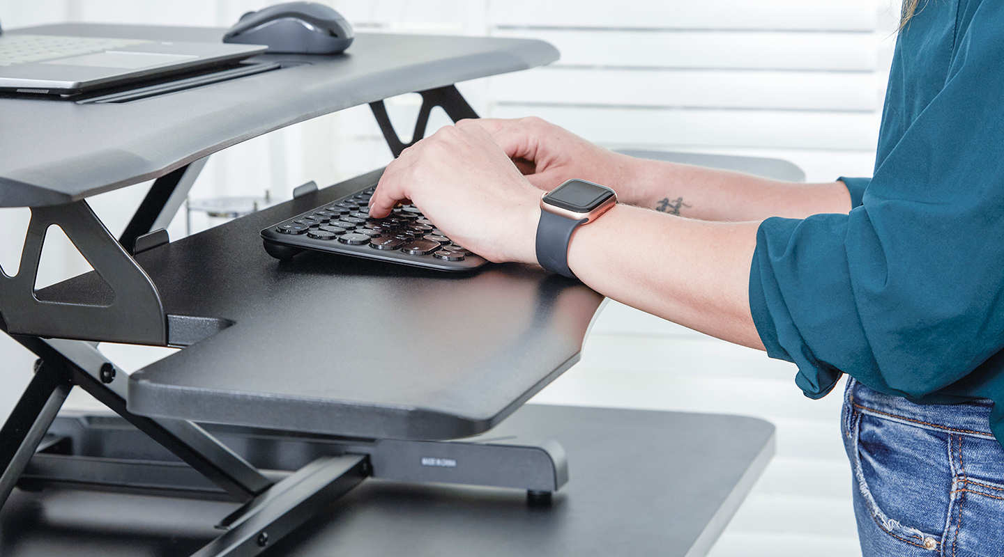stand up desk riser allows you to type in comfort