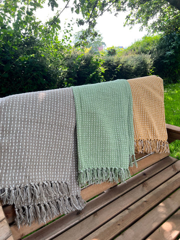 Blanket throws on bench 
