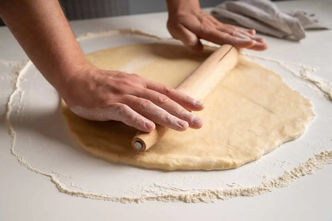 Preparing roti with hands