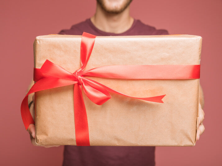 Man holding gift box in his hands