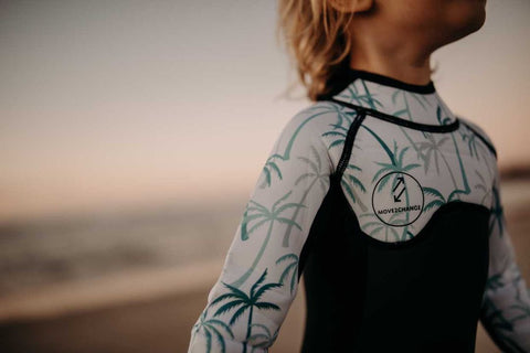 Close up of palm kids wetsuit