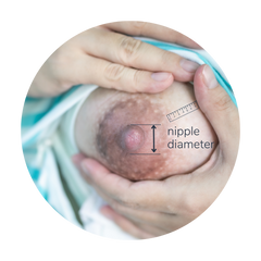 photo of a lactating nipple with nipple measurement marked