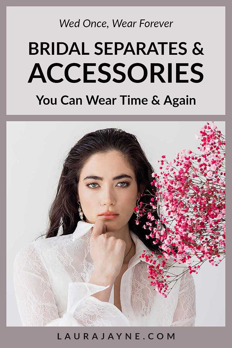 Woman with hand to chin wearing white lace blouse and Laura Jayne Accessories earrings with pink flowers in the side foreground