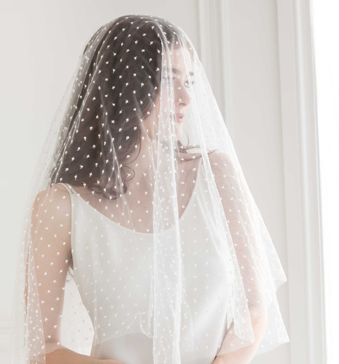 Bride wearing blusher veil