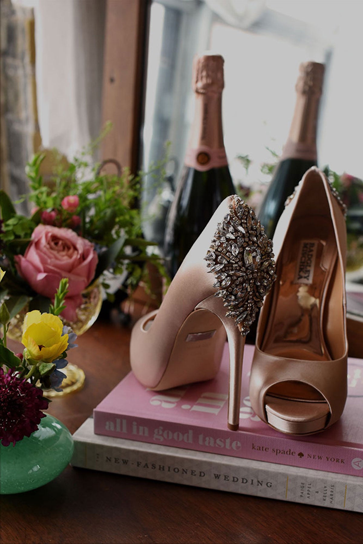 wedding shoes and champagne bottle