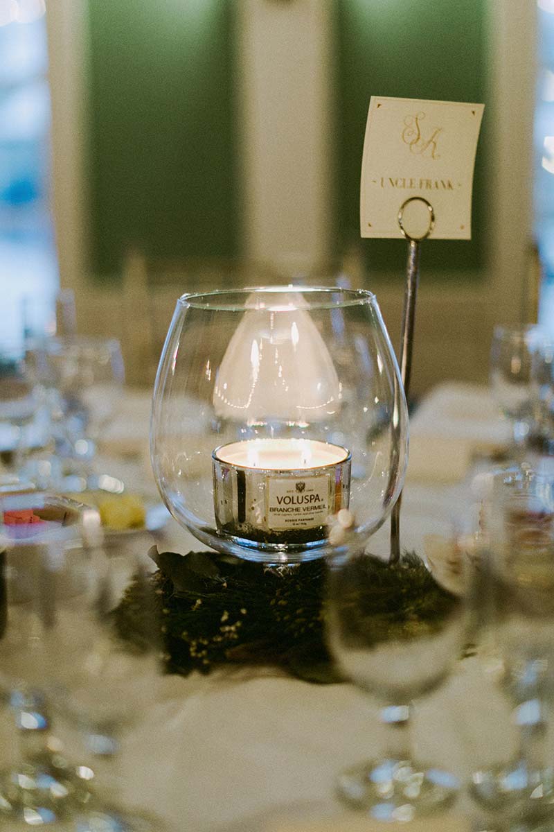 festive candle at the wedding table 