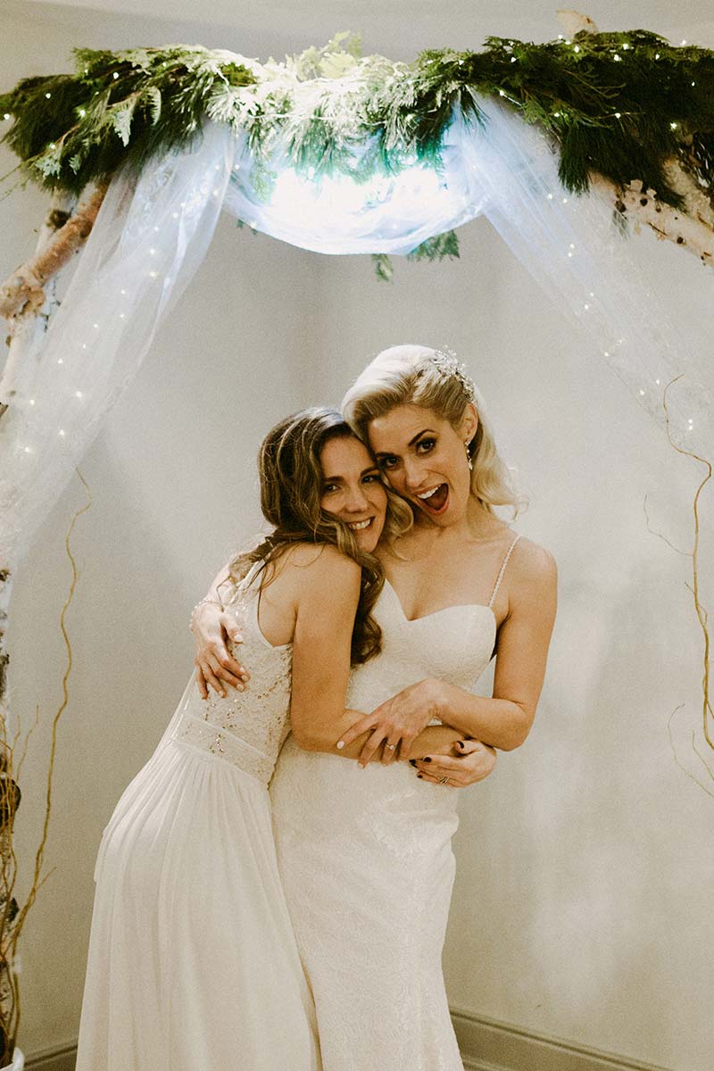 happy bride with a bridesmaid 