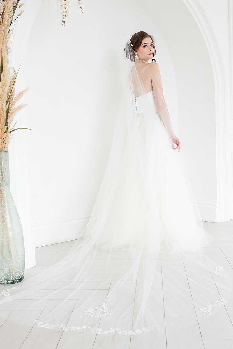 Back view of bride wearing monogram cathedral veil by Laura Jayne Accessories in Toronto