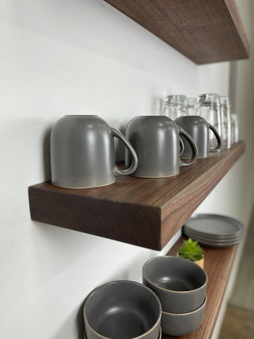 floating shelves with cups and glasses