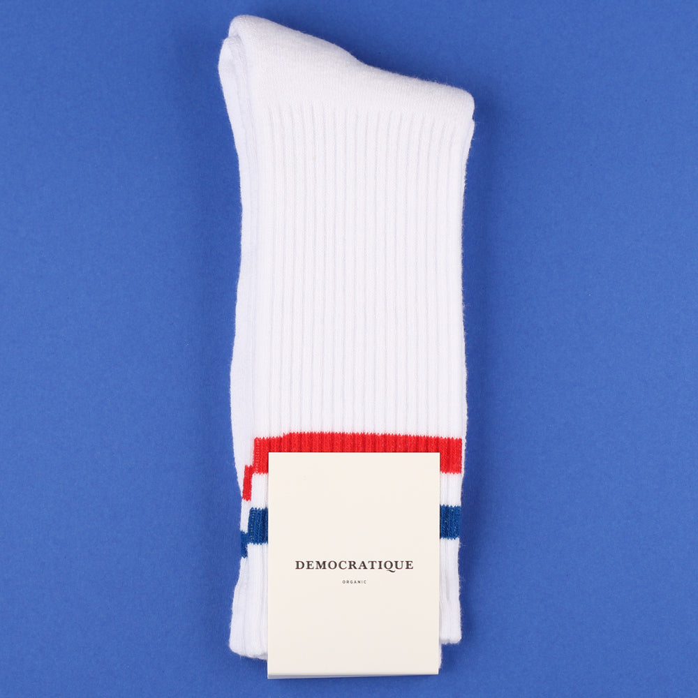 White sneaker socks with red and blue stripes from Democratique Socks