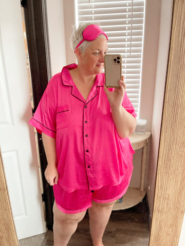 OneRealMomma modeling satin 2 piece pajama set from target from the stars above plus size line