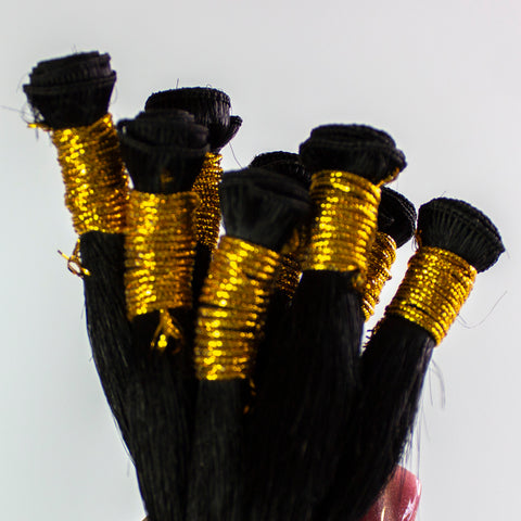Hand tied wefts
