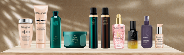 Curly hair products from Kerastase, Oribe, and Kevin Murphy for purchase at Salon Society Regina