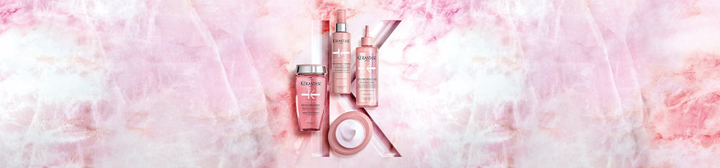 Kerastase Chroma Absolu products on a pink background