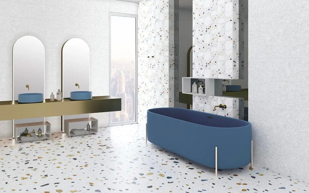 A white bathroom with terrazzo tiles