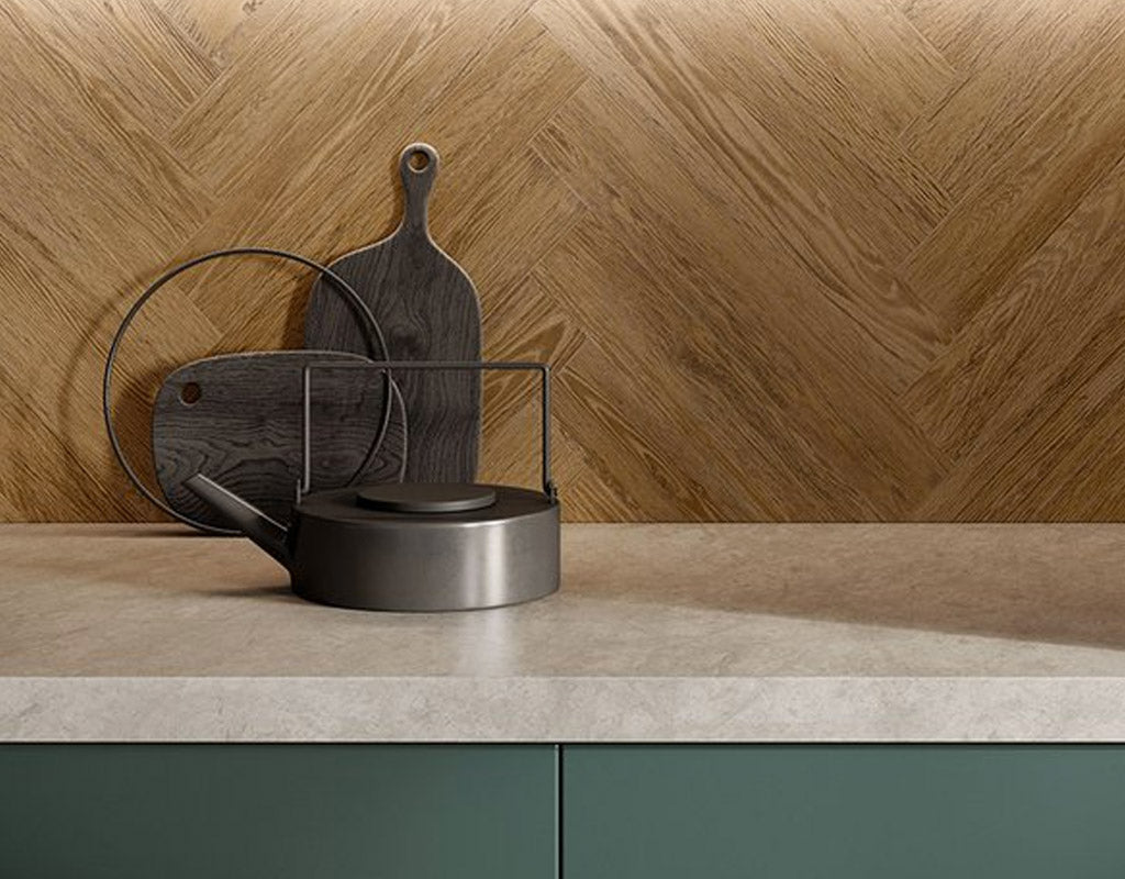 Herringbone wood tiles laid on a kitchen splashback wall