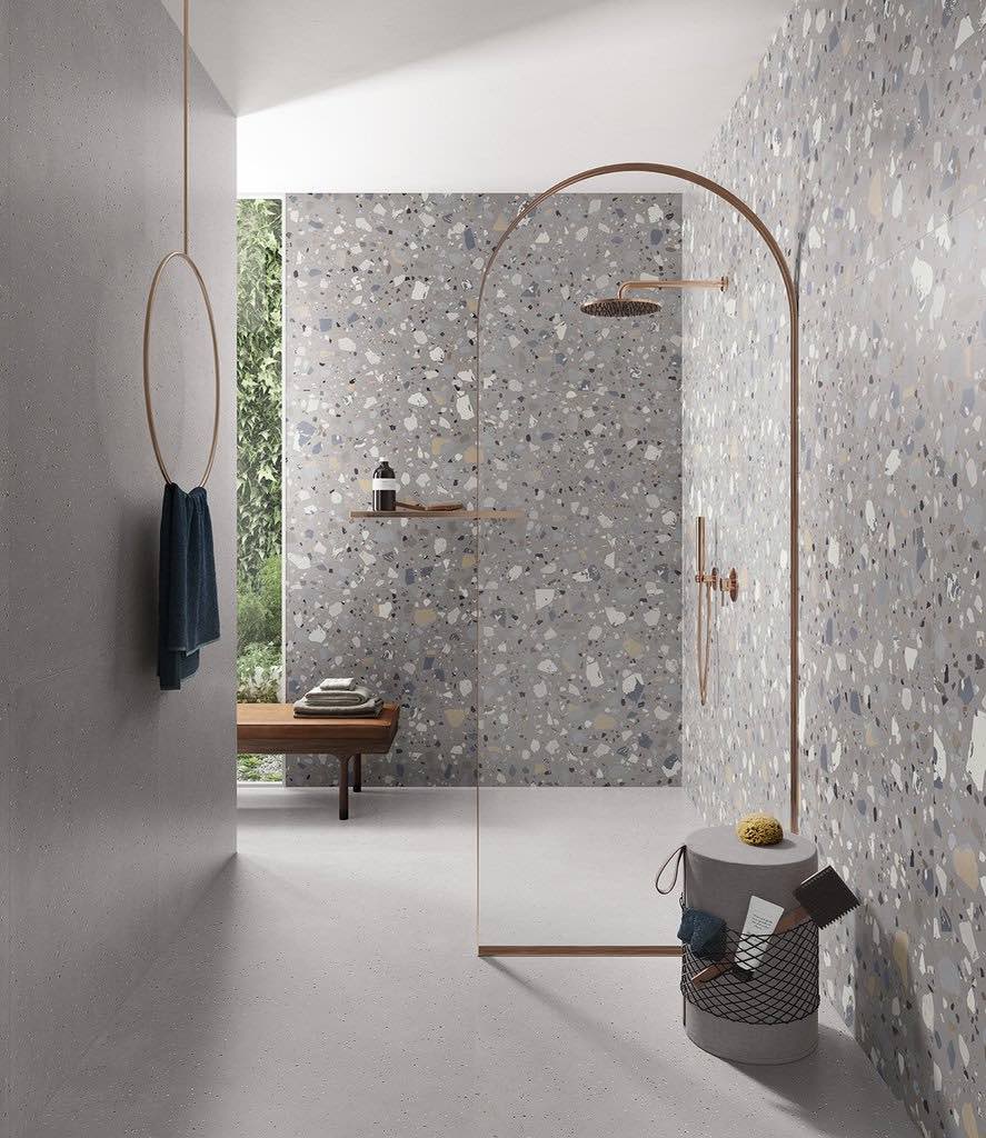 Grey terrazzo tiles in a modern wetroom