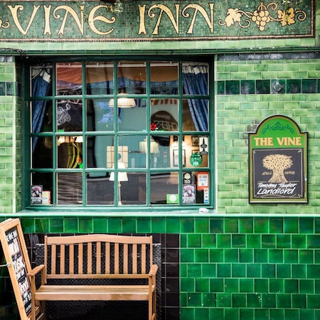 Green Tiles on Front of Pub