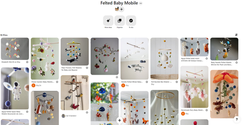 a screen shot of the Magic Trout Imaginarium's pinterst board shows a collection of many types of felted baby mobiles