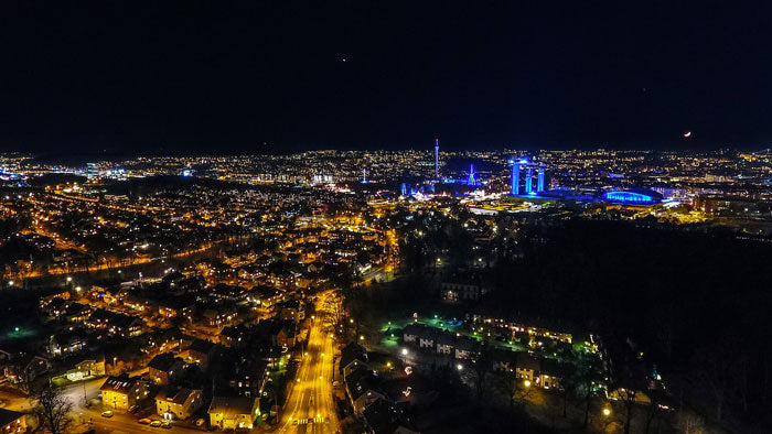 City landscape taken by aerial photography drone flying at night