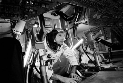 Michael Collins practicing in a simulator for Apollo 11 launch