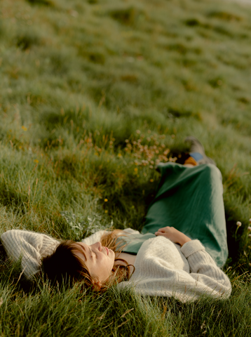 Girl lying in the grass