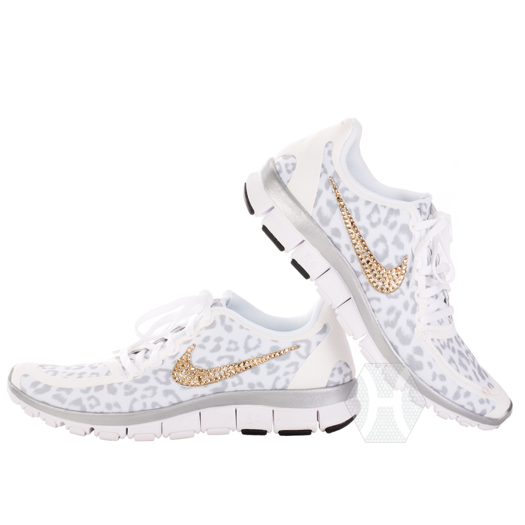 white and silver cheetah nike shoes