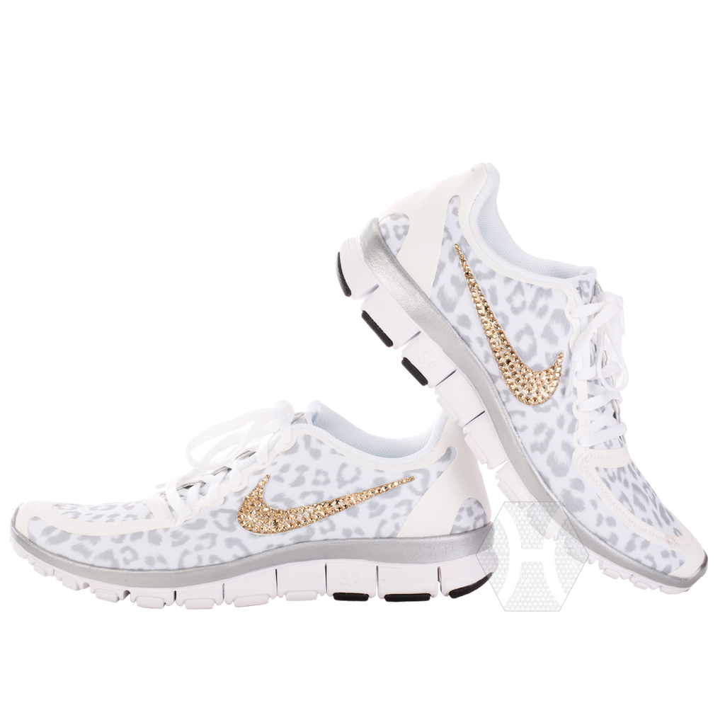 white cheetah nike shoes