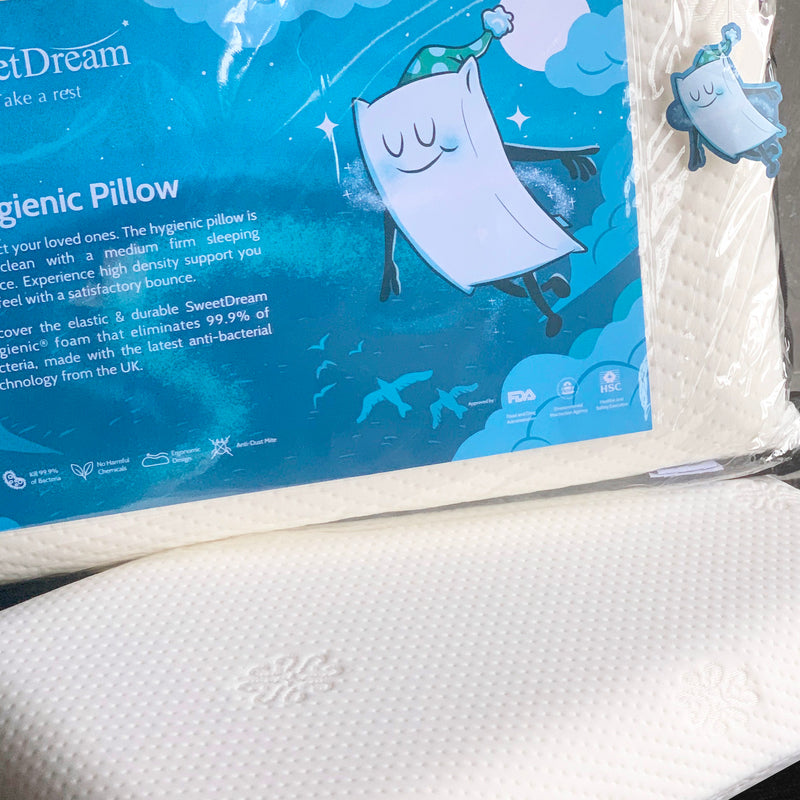 Packaged Spa Hygienic Pillow with sticker visible on top of another unpackaged one