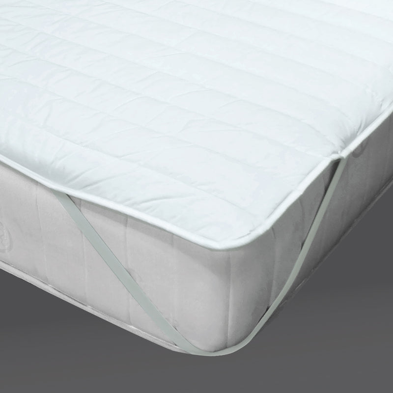 Home Mattress Protector strapped in a mattress with a grey background
