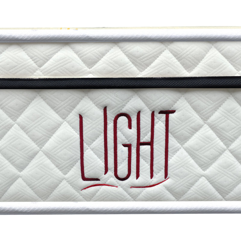 Close up front view of Light mattress with label visible