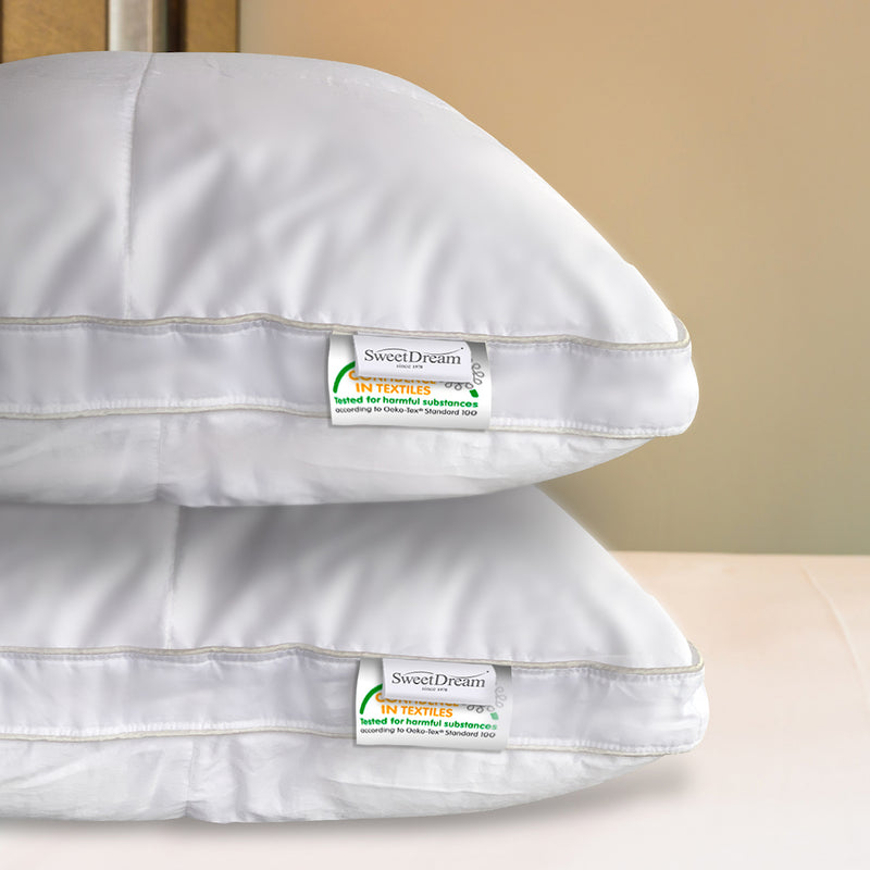2 Swan Pillows on top of each other with SweetDream logo visible