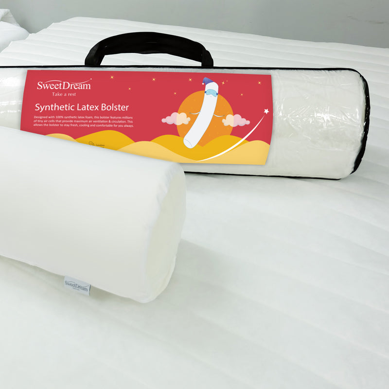 Resort Latex Feel Bolster in packaging placed behind another unpackaged on a white mattress