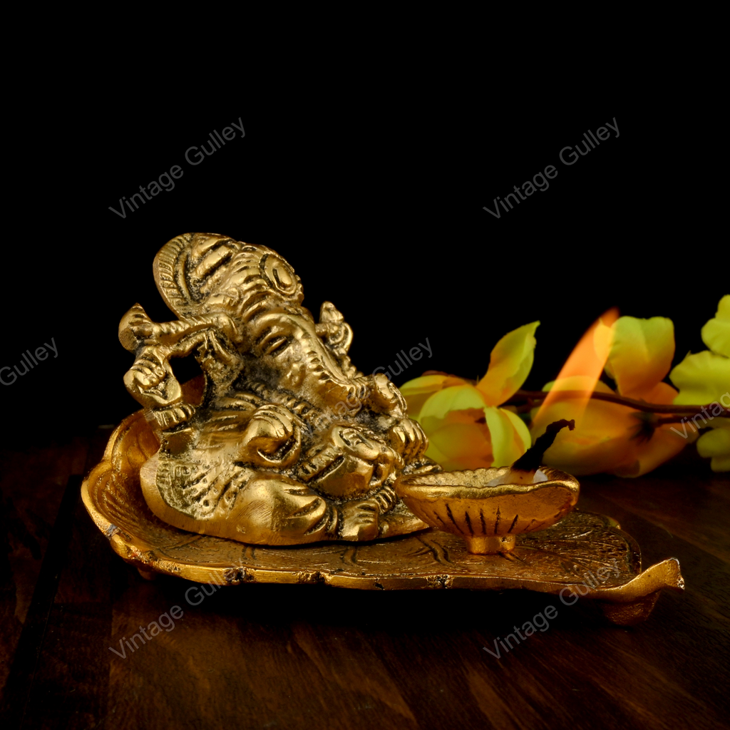 White Metal Golden Oxidized Peepal Patta Ganesha with Diya ...