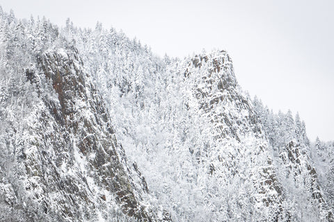 cliffs of Dixville Notch State Park covered in snow
