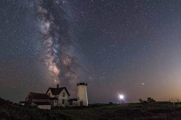 The Milky Way core rising over Stage Neck Light in Chatham, Massachusetts